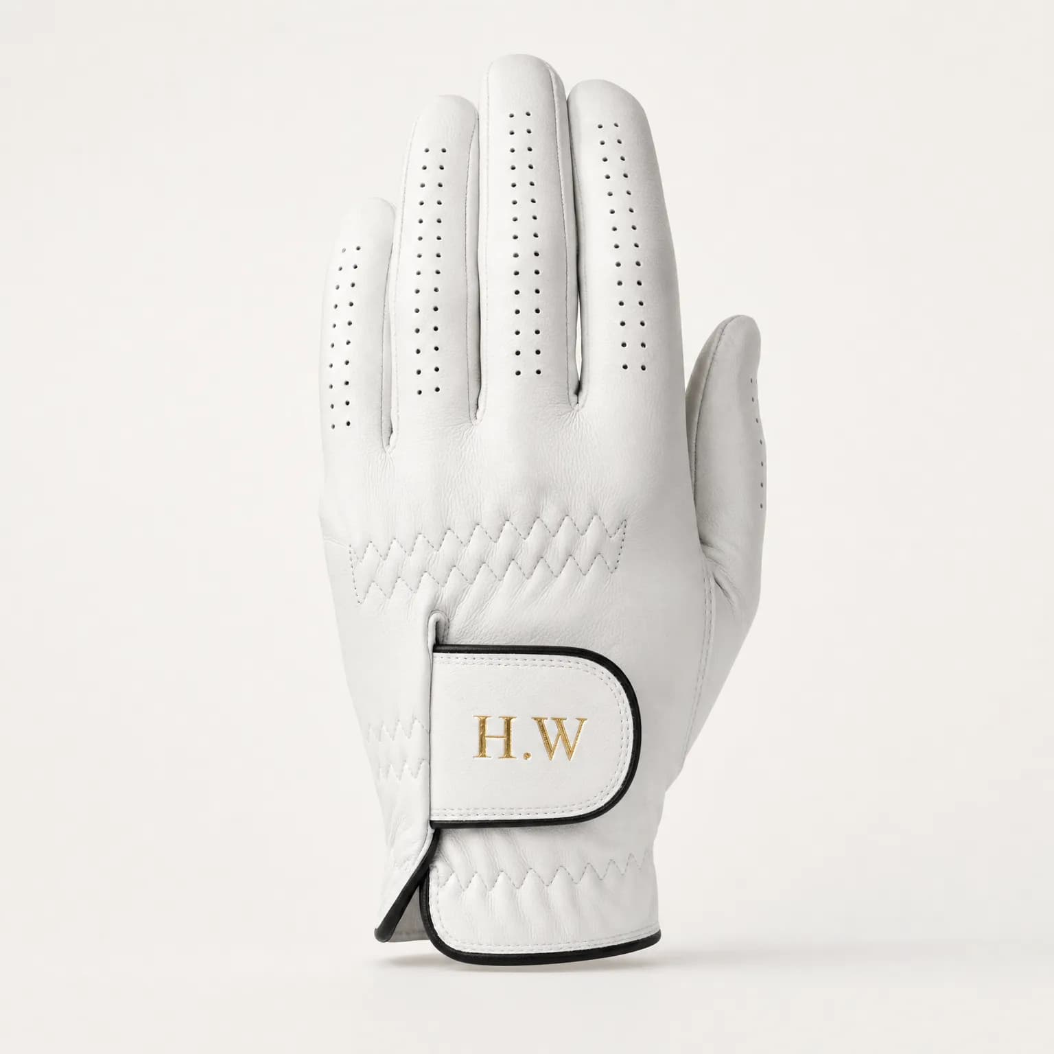 White Gilded Grip golf glove with initials hot-stamped in gold foil